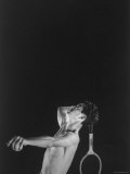 High Speed Photograph of Tennis Pro Bobby Riggs Serving a Ball