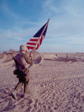 US Marine Carrying American Flag to Free Kuwait from Iraqi Occupation