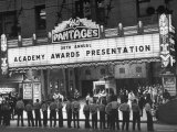 Buy Attendants in Front of Pantages Theater Await Celebrities to Arrive for 26th Annual Academy Awards at AllPosters.com