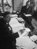 Playwright Jean Paul Sartre at His Desk as Artist Saul Steinberg Sketches at Sartre