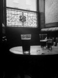 Half Empty Glasses of Beer Left on Table in the Blue Lion Pub in Dublin