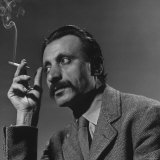 Excellent Portrait of Painter Arshile Gorky, Smoking a Cigarette, at Gjon Mili's Studio