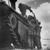 American Soldiers Wounded During Landing on Guam Being Loaded Onto Amphibious Truck for Evacuation
