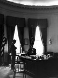 President John F. Kennedy with Brother, Attorney General Robert Kennedy in White House Office