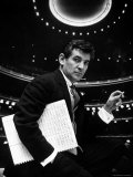36 Year Old Composer Leonard Bernstein, Holding Musical Score with Lighted Auditorium Behind Him
