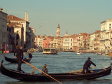 Gondoliers with Passengers in Venetian Canals, Venice, Italy