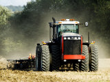 4 Wheel Drive Tractor Pulling a Disc Harrow, Cotswolds, England