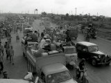 Refugees Fleeing the Advance of Communist Forces Pour into Saigon