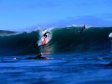Surfers in Manu Bay, New Zealand