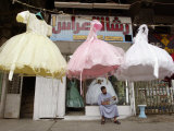 An Iraqi Man Reads a Newspaper