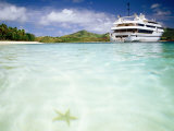 Blue Lagoon Cruises Ship and Starfish in Water, Fiji
