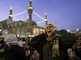 A Shiite Muslim Worshipper Sings the Call for Prayer at the Kadhimiya Shrine