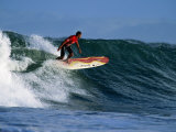 Surfer on Wave at Manu Bay, Raglan, New Zealand