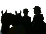 Buy A Pair of Young Girls Wait with Their Horses at AllPosters.com