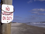 Buy An Ironic Sign Warns "No Lifeguard" on a Totally Empty Beach at AllPosters.com