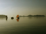 Buy Cluster of Kabangs Reflected in a Quiet Sea at Dusk at AllPosters.com
