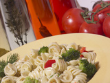 Buy Bowl of Pasta with Herb Garnish and Tomatoes at AllPosters.com