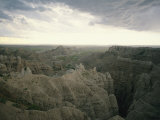 Buy A Storm Moves over Sheep Mountain Table in Badlands National Park at AllPosters.com