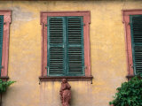 Buy Statue Under Shutters in Seleginstadt, Hesse, Germany at AllPosters.com