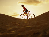 Side Profile of a Young Woman Cycling