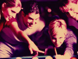 Two Young Couples Playing Pool