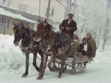 Buy A Sleigh Serves as a Taxi on a Snow-Covered Village Street at AllPosters.com