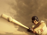Low Angle View of a Baseball Player Swinging a Baseball Bat