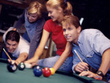 Two Young Couples Playing Pool