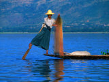 Intha Fisherman Tending to Nets and Rowing, Inle Lake, Shan State, Myanmar (Burma)