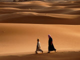 Buy Men Walking Across Sand Dunes, Merzouga and the Dunes, Morocco at AllPosters.com