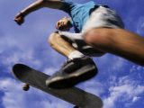 Buy Young Man Skateboarding at AllPosters.com