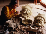 Buy Artisan Creating Traditional Cham Mask, Sichuan, China at AllPosters.com