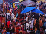 Hindu Pilgrims Bathe in Sacred Ganges River at Dasaswamedh Ghat, Varanasi, Uttar Pradesh, India