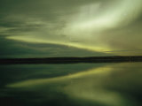 The Aurora Borealis is Reflected Brightly in the Mackenzie River