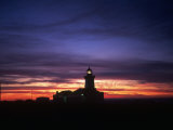 Buy Light from Lighthouse at Night, Spain at AllPosters.com