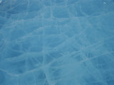 Buy A Thick Piece of Ice Reflects Blue Light from its Cracked Surface at AllPosters.com