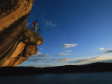 A Cyclist Atop a Rock Overhang Near Dolores, Colorado
