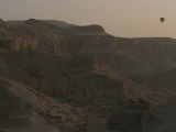A Hot-Air Balloon in Flight over Egypts Valley of the Kings