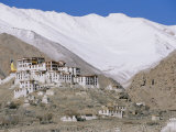 Buy A Tibetan Temple is Built Atop a Hill with the Himalaya Mountains as a Backdrop at AllPosters.com