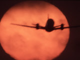 Buy Jetliner Takeoff Framed by Sunset at AllPosters.com