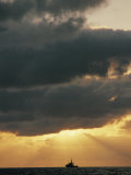 The Sun Shines Through the Clouds over the Atlantic Ocean