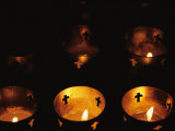 Votives Burn in a Darkened Church in Santa Fe