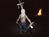 A White Mountain Apache Dances by Firelight in a Puberty Rites Ceremony