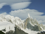 Clouds over Patagonias Snow-Covered Cerro Torre Massif