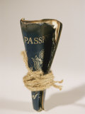 An Old Passport is Bound in Twine