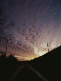 Buy Clouds at Twilight Create Purple and Pink Streaks Across the Sky at AllPosters.com
