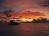 A Passenger Boat Silhouetted on Truk Lagoon at Sunset