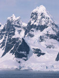 Snow-Covered Mountains on Wienke Island, off the Antarctic Peninsula