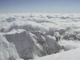 Buy The Snow-Veiled Peaks of the Himalayas Camouflaged by Clouds at AllPosters.com