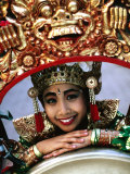 Buy Portrait of a Young, Legong Dancer Posing on Decorative Gong, Peliatan, Indonesia at AllPosters.com